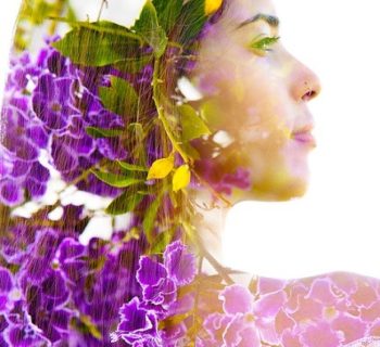 Double exposure with an ecological concept showcasing the beautiful femine nature of purple flowers